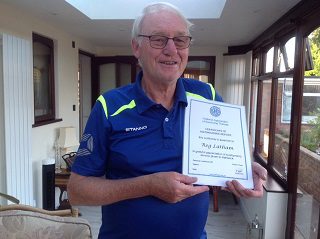 Reg Latham with Certificate